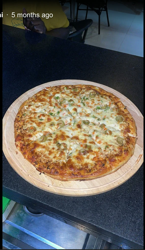 Freshly baked chicken supreme pizza